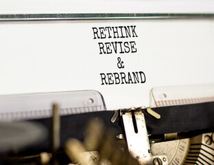 Rethink revise rebrand symbol. Concept word Rethink Revise and Rebrand typed on typewriter....