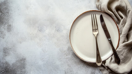 Empty plate with a fork, knife and textile napkin top view, copy space. AI generative