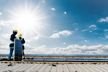 Worker Technicians are working to construct solar panels system on roof with sky and clound on...