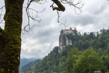 Lake Bled Slovenia. Beautiful mountain lake with small Pilgrimage Church. Most famous Slovenian lake and island Bled with Pilgrimage Church of the Assumption of Maria and Bled Castle in background.