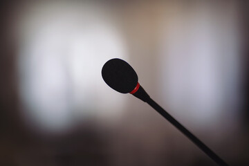 Close up of microphone in concert hall or conference room. Microphones during business conference...