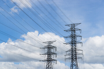 Pylon and high voltage powerline over the blue sky