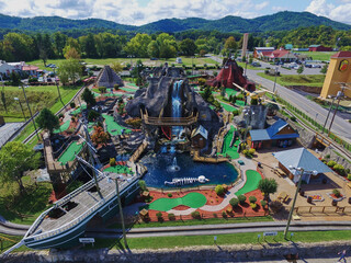 Aerial View of Colorful Miniature Golf Course with Pirate Ship and Volcano