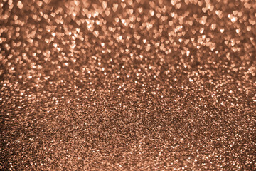 Peach fuzz sparkling glitter hearts bokeh background