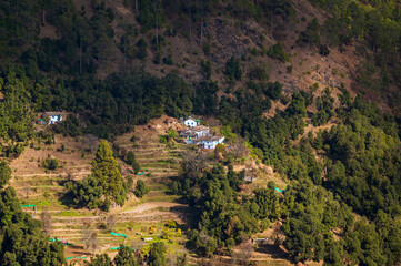 Fototapeta na wymiar Landscape in the mountains. Village in hills of Himalaya in the Kumaun region, Uttarakhand, India,