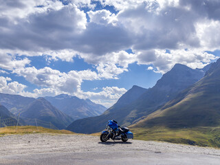 Motorbike on Route des Grandes Alpes near Col de l'Iseran, Savoy, France