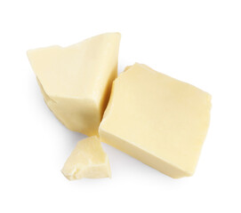 Pieces of tasty chocolate isolated on white, top view