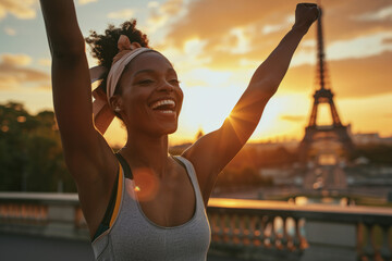 Portrait of a happy athlete celebrating winning success with France, Paris Eiffel tower background