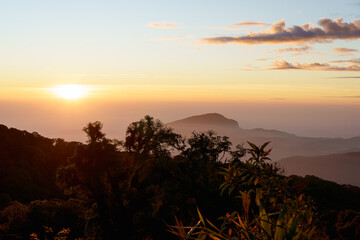 Beautiful silhouette landscape sunrise at Doi inthanon national park, chaingmai thailand.