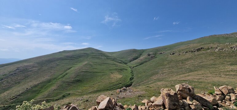 Armenia landscape, village, mountains, lake Sevan, summer scenery oncoming storm
