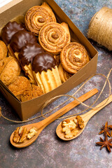 Fototapeta premium Assorted cookies in a box. Christmas atmosphere. Top view
