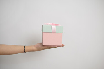 person holding a giftbox