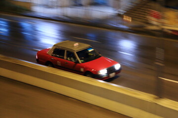 fast moving car, hong kong taxi