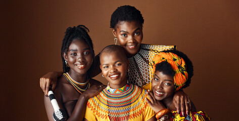 Fashion, beauty and heritage with group of black women in studio on brown background together for...