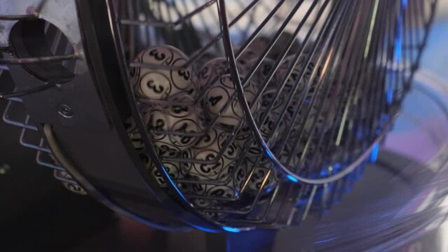 Balls with numbers rotate in a lottery machine