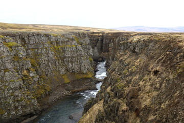Kolugljúfur is a very pretty canyon located in the north of Iceland and known for its Kolufossar falls that flow to the bottom of the gorge