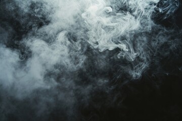 Smoke captured in a close-up shot against a black background. Versatile image suitable for various uses