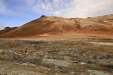 Hverarönd is a hydrothermal site in Iceland with hot springs, fumaroles, mud ponds and very active solfatares. It is located in the north of Iceland
