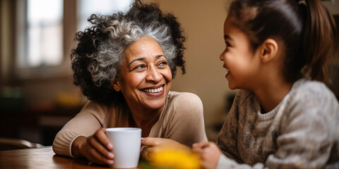 Best Friends Chatting: Senior Ethnic Woman with her graddaughter Enjoying Time