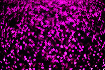 blur magenta star shape neon light from camera lens for pattern and background.