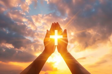 Hands holding a crucifix, a believer praying with his arms crossed, Jesus Christ, divine light from heaven - obrazy, fototapety, plakaty