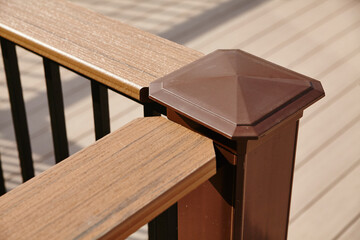 Golden Brown Deck Railing and Chocolate Post Cap with Shadows