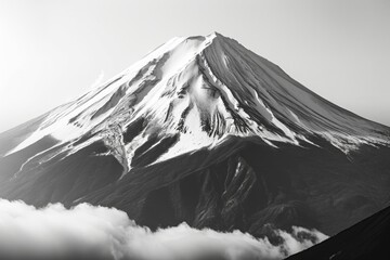 A black and white photo of a snow covered mountain. Perfect for winter-themed designs and nature enthusiasts