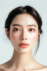 Naklejka premium A stunning young woman with flowing black hair. Perfect for fashion or beauty concepts