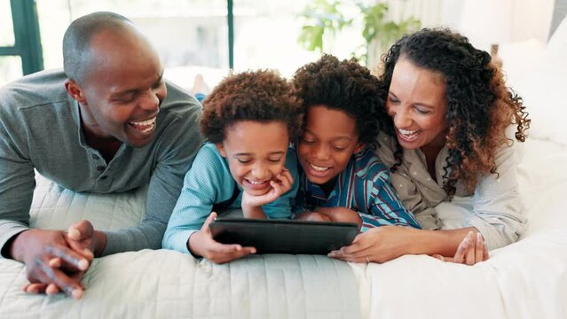 Black family, bed and tablet with youth game, smile and funny meme in the morning. Laughing, tech and happy father with children and mother together with care, social media and web at home online