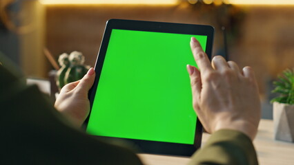 Mockup tablet worker scrolling display browsing social media at office close up.