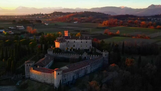 Sunset on the Friulian hills with a view of the Villalta castle. Fagagna.
