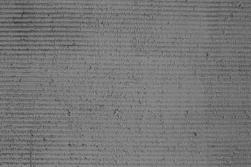  Striped   texture on a cement wall close-up.
