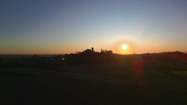Sunset on the Friulian hills with a view of the Villalta castle. Fagagna.