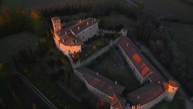 Sunset on the Friulian hills with a view of the Villalta castle. Fagagna.