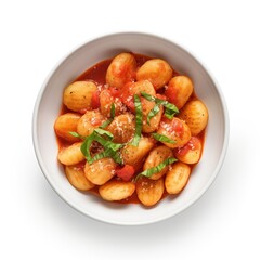 A plate of gnocchi top view isolated on a white background