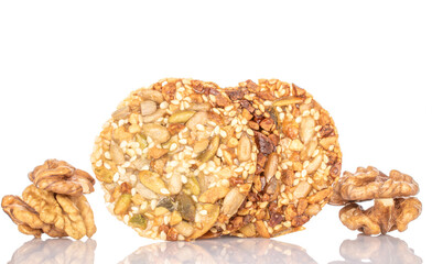 Two sweet Thaler cookies with nuts, macro, isolated on white background.