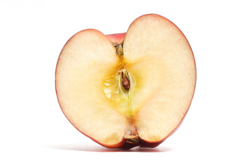 Half cut fresh organic red apple delicious fruit side view isolated on white background clipping path