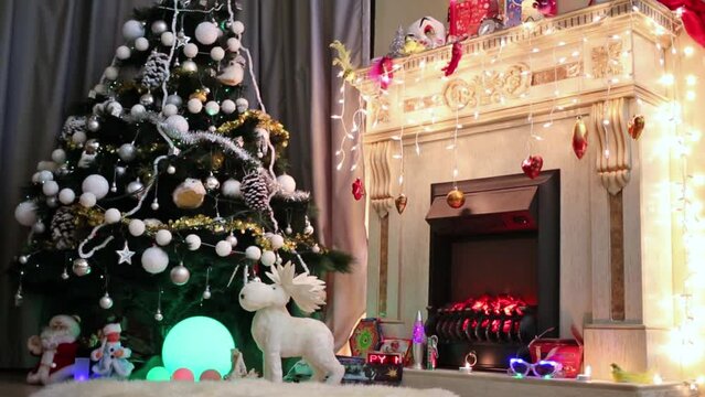 Beautiful decorated by toys and garlands christmas tree