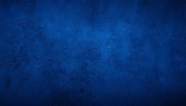 dark blue rough grainy stone or concrete wall texture background