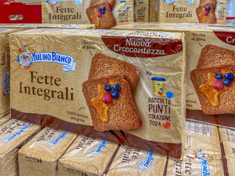 Italy - January 24, 2024: Mulino Bianco Barilla whole wheat rusks in packages displayed for sale in Italian supermarket. Tex: Fette Integrali (Whole-wheat rusks)