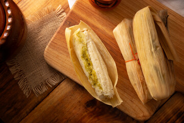 Tamales. hispanic dish typical of Mexico and some Latin American countries. Corn dough wrapped in...