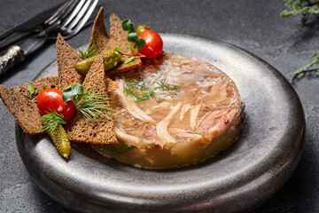 Savory aspic with rye crisps, pickles, mustard, and horseradish, a rich symphony of textures and tastes