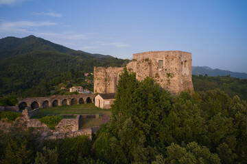 Fototapeta na wymiar This high-resolution image showcases the historical castle against the stunning landscape. Capture the panoramic beauty of Aghinolfi Castle in Montignoso, Italy, through stunning drone photography.