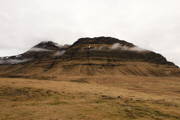 Fototapeta na wymiar Kirkjufell is a remote mountain in Iceland, located on the Snæfellsnes peninsula