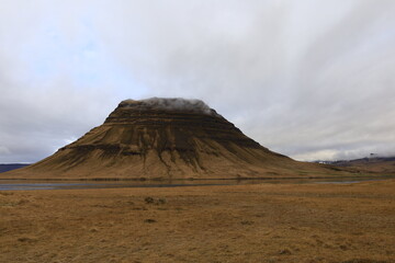 Kirkjufell is a remote mountain in Iceland, located on the Sn&aelig;fellsnes peninsula