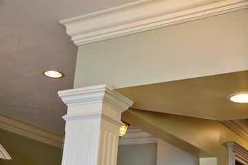 Elegant Crown Molding and Ceiling Lights in Modern Home © Nicholas J. Klein