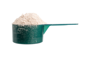 Chocolate whey protein powder in a plastic measuring spoon, isolated on transparent background