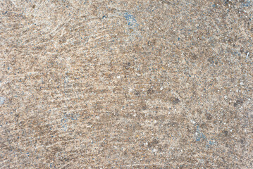 Closeup detailed rough scratched brown stone textured background