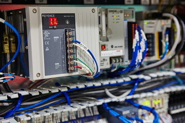 Industrial Electrical Panel Close-Up with Digital Voltage Readout