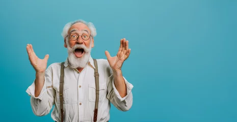 Papier Peint photo autocollant Vielles portes Old hoary man wearing glasses over isolated blue background. Crazy and scared with hands on head, afraid and surprised of shock with open mouth Closeup photo of excited crazy attractive grandpa 